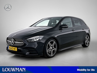 Mercedes-Benz B-klasse 180 Business Solution AMG | AMG Line | Trekhaak | Stoelverwarming | Cruise Control | Inclusief 24 maanden Mercedes-Benz Certified garantie voor Europa.