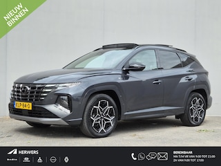 Hyundai Tucson 1.6 T-GDI HEV N Line / Trekgewicht 1650 kg / Elektrische achterklep / Glazen schuif- en kanteldak / Stuur- Stoel & Achterbank verwarming / Rondomzicht camera / Adaptief cruise control / Keyless Entry/Start / Apple Carplay Android Auto /