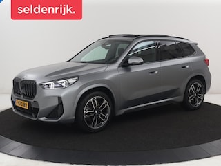 BMW X1 xDrive23i M-sport | Panoramadak | Head-up | Harman Kardon | Stuur/Stoelverwarming | 360 camera | Carplay | Memory | Climate control | Sfeerverlichting | Full LED | Leder / Alcantara
