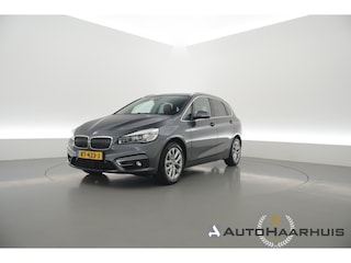 BMW 2-serie Tourer 218i Luxury High Ex. | Rijklaar! | Orig. NL | Trekhaak | HUD | Memory | Camera+PDC | Stoelverw. | Leder | Nav | Cruise | Keyless | LED | 17'' V
