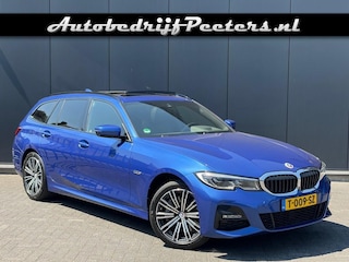 BMW 3-serie Touring 330e xDrive M Sport 50 Jahre Pano Laserlicht HUD Memory e.Trekhaak