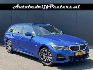 BMW 3-serie Touring 330e xDrive M Sport 50 Jahre Pano Laserlicht HUD Memory e.Trekhaak