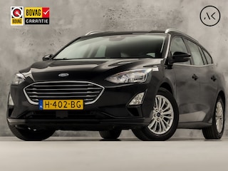 Ford Focus Wagon 1.0 EcoBoost Titanium Sport Automaat (APPLE CARPLAY, GROOT NAVI, CLIMATE, TREKHAAK, SPORTSTOELEN, KEYLESS, LED KOPLAMPEN, LM VELGEN, LANE ASSIST, NIEUWSTAAT)