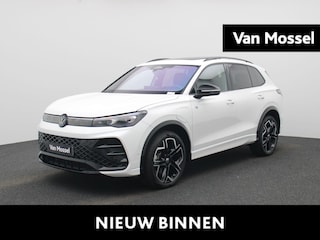 Volkswagen Tiguan 1.5 eHybrid R-Line Edition 272 PK | R-Line | Automaat | Navigatie | Panoramadak | Harman Kardon | Inklapbare trekhaak | Head-up display | 360 Camera | Stoelmassage | Stoelventilatie voor | Stoelverwarming voor + achter | Stuurverwarming | HD Matrix |
