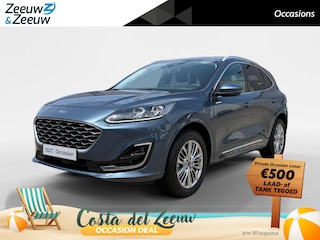 Ford Kuga 2.5 PHEV Vignale | Dealer onderhouden | Automaat | Adapt. Cruise control | BLIS | Elektr. achterklep | Winter pack | lederen bekleding | Parkeersensoren voor en achter | Camera voor en achter | Navigatie | Apple carplay & Android auto | B&O audio | Privacy glas | Bovag garantie |