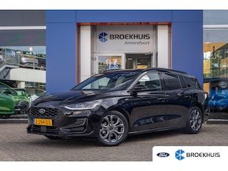 Ford Focus Wagon 1.0 EcoBoost Hybrid ST Line | 155pk | Trekhaak | Adaptive Cruise | Apple Carplay/Android Auto | Blind Spot Warning | Stoel/Stuur/Voorruitverwaming | Achteruitrijcamera | Apple Carplay/Android Auto|telefoonintegratie premium | Buitenspiegels elektrisch inklapbaar | Cruise control adaptief met Stop&Go en stuurhulp