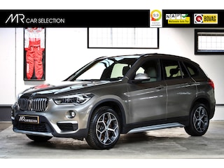 BMW X1 sDrive20i High Executive | X line | Panoramadak | Stuurwiel verwarming | Leder | Achteruitrijcamera