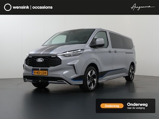 Ford Transit Custom 300 2.0 TDCI | 170 PK | AUT. | L2 H1 | SPORT | GLASSLOOK-PANELEN | 2X ZIJSCHUIFDEUR | BLIND SPOT | STOELVERWARMING | STUURWIELVERWARMING | KEYLESS GO | ADAPTIEVE CRUISE CONTROL | 19" VELGEN | NAVIGATIE | CARPLAY | ANDROID AUTO