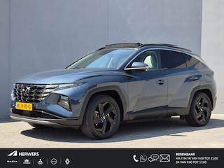 Hyundai Tucson 1.6 T-GDI PHEV Premium Sky 4WD / Glazen schuif- en kanteldak / Rondomzicht camera / Trekgewicht 1.350 kg / Elektrische achterklep / Stuur- Stoel & Achterbank verwarming / Adaptief cruise control / Stoelventilatie / Apple Carplay Android Auto /