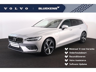 Volvo V60 T6 Recharge AWD Plus Bright - IntelliSafe Assist - Harman/Kardon audio - Adaptieve LED koplampen - Parkeercamera achter - Verwarmde voorstoelen, stuur & achterbank - Parkeersensoren voor & achter - Elektr. bedienb. voorstoelen met geheugen - Extra getint glas - Inklapbare trekhaak - 19' LMV
