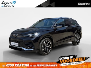 Volkswagen Tiguan 1.5 eTSI R-Line Business | Elektrisch wegklapbare trekhaak | Stoelmassage | Elektrisch bedienbare achterklep | Achteruitrijcamera | Parkeersensoren voor- en achter | Navi | Adaptive cruise control | Sportstoelen