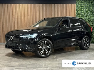 Volvo XC60 T6 AWD Recharge Plus Dark Long Range | Trekhaak | Harman Kardon | Adaptieve Cruise Control | Stoelverwarming voor+achter | Stuurwielverwarming | Parkeercamera | Full LED Meesturende koplampen | Pilot Assist | Elektrische voorstoelen geheugen | R-Design Contour stoelen met wit stiksel en bies | Zitting verlenging voorstoelen | Schuifdak | Google Infotainment | 19 Inch | Keyless Drive | Parkeersensoren voor+achter | Privacy Glass | DAB Radio | Apple Carplay/Android Auto | Draadloos telefoon opladen | Volvo On Call met mobiele App functie | Onyx Black Metallic |