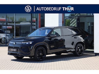 Volkswagen Tayron 1.5 eHybrid R-Line 60 mnd / 100.000km garantie, Harman Kardon geluidssysteem, lederen bekleding, LED Matrix (IQ.Lights), comfort pakket plus (verwarmbare voorstoelen, verwarmbare achterbank, verwarmbaar multifunctioneel lederen stuurwiel), wegklapbare trekhaak, rondomzichtcamera (area view), elektrische achterklep (Easy Open), ErgoActive voorstoelen met geheugen en massagefunctie, 20" 'York' LMV, adaptief onderstel (dcc), black style pakket