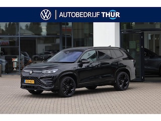 Volkswagen Tayron 1.5 eHybrid R-Line 60 mnd / 100.000km garantie, Harman Kardon geluidssysteem, lederen bekleding, LED Matrix (IQ.Lights), comfort pakket plus (verwarmbare voorstoelen, verwarmbare achterbank, verwarmbaar multifunctioneel lederen stuurwiel), wegklapbare trekhaak, rondomzichtcamera (area view), elektrische achterklep (Easy Open), ErgoActive voorstoelen met geheugen en massagefunctie, 20" 'York' LMV, adaptief onderstel (dcc), black style pakket
