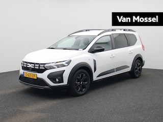 Dacia Jogger 1.0 TCe 110Pk Extreme 7p. | Navigatie | Climate Control | Cruise Control | Trekhaak | Apple Carplay/Android Auto | Parkeersensoren Voor & Achter met Camera | Blind Spot Warning | Privacy Glass | Lichtmetalen Velgen | Keyless Start & Go | Stoelverwarming |