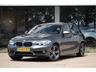 BMW 118i | Schuif/Kanteldak | Navi | Trekhaak | Stoelverw. | PDC | Clima | Cruise