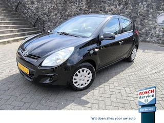 Hyundai i20 1.2i i-Motion Airco, afneembare trekhaak, electr ruiten, audio met stuur bediening.