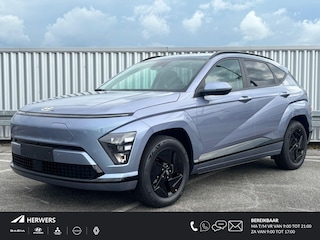 Hyundai Kona Pure Edition 64.8 kWh / €1500,- Voordeel / Uit Voorraad Leverbaar / Stoel- & Stuurverwarming / Achteruitrijcamera / Parkeersensoren Voor + Achter / Dynamische Navigatie / Climate Control / Adaptive Cruise Control /