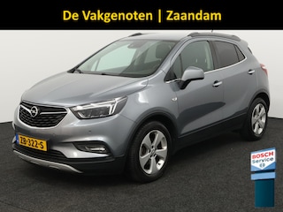 Opel Mokka X 1.4 Turbo Innovation trekhaak, airco, cruisecontr, electr stoel, Apple Carplay/Android Auto, Achteruitrijcamera, Parkeersensor voor/achter De Opel Mokka X 1.4 Turbo Innovation is een ruime en luxe SUV die comfort en stijl perfect combineert. Dankzij de krachtige en soepele turbomotor biedt deze auto een prettige rijervaring, ter