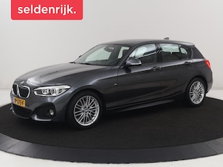 BMW 118i High Executive M-sport | Leder | Full LED | Climate control | Stoelverwarming | Park assist | Cruise control | DAB | Bluetooth | Sfeerverlichting |