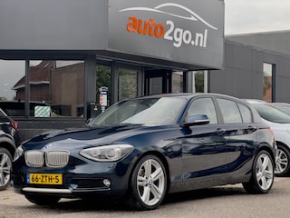BMW 116i UPGRADE EDITION 136PK LEDER NAVI AIRCO LED LMV PDC