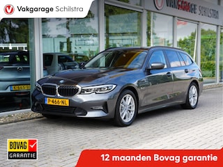 BMW 3-serie Touring 320e Business Edition | Stoelverwarming | Draadloze telefoonoplader | Apple Carplay/Android Auto