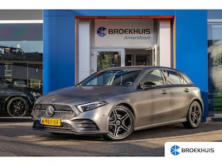 Mercedes-Benz A-klasse 180 Business Solution AMG | Premium kleur mat grijs | Stoel verwarming | Camera | Widescreen | Navi | Cruise control | Clima control | | AMG-styling | Achteruitrijcamera | Apple Carplay/Android Auto|telefoonintegratie premium