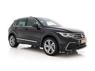Volkswagen Tiguan 1.4 TSI eHybrid R-Line Business+ (Plug-in) (INCL-BTW) Aut. *LEATHER-FABRIC | FULL-LED | ADAPTIVE-CRUISE | CAMERA | DIGI-COCKPIT | KEYLESS | PRIVACY-GLASS | SPORTSEATS | SHIFTPADDLES | NAVI-FULLMAP | ECC | PDC | 19''ALU*