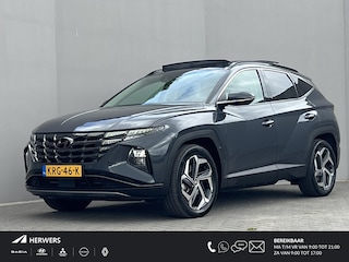 Hyundai Tucson 1.6 T-GDI PHEV Comfort Smart Sky 4WD / Dealer onderhouden / SoH accu 100 % / Panorama schuifdak / 1.350 kg trekgewicht / Navigatie / Apple Carplay Android / Stuur- en stoelverwarming / 19"LM wielen /