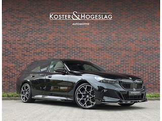 BMW 5-serie Touring 550e xDrive | M Performance - Pano - B&W