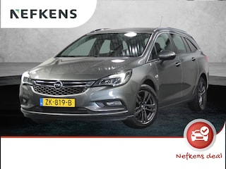 Opel Astra ST 105PK 120 Jaar Edition | 1ste eigenaar | Camera | Trekhaak | AppleCarPlay/Android | Armsteun | AGR stoelen | Navigatie | Climate Control | Cruise Control | Isofix | Privacy Glass | Parkeersensoren |