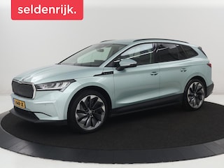 Skoda Enyaq iV 60 | SOH 92.1% | Trekhaak | Stuur/stoel verwarming | Half Leder | Cruise control | Camera | Carplay | Standkachel | Sfeerverlichting | 21''