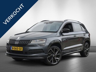 Skoda Karoq 1.5 TSI Sportline Busines | trekhaak | camera |stuurverwarming