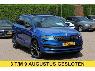 Skoda Karoq 2.0 TSI 4x4 Sportline Business / NL Auto! / Trekhaak / Panoramadak / Camera / CarPlay / Keyless / 19'' / DAB / Cruise Control