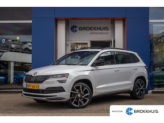Skoda Karoq 1.5 TSI ACT Sportline Business | Trekhaak (weg-klap) | Pano-dak | 360 camera | Adap.cruise | Premium audio | Stoel+stuur verwarming | Digitaal dashboard | 360 Camera  | Apple Carplay/Android Auto|telefoonintegratie premium | Audio installatie premium