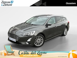 Ford Focus Wagon 1.0 EcoBoost Titanium Business | Trekhaak | HUD | Achteruitrijcamera | Winter Pack | Dodehoek detectie | Elektr. Achterklep | 12 maanden garantie! |