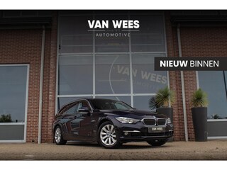 BMW 3-serie Touring 318i Executive | Luxury Line | 2e eigenaar | Sportstuur | Cruise control | Navigatie | Bluetooth | Climate control | PDC | Trekhaak | Lichtpakket | Regensensor