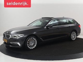 BMW 5-serie Touring 520i High Executive | Panoramadak | Trekhaak | Head-Up | Stoelventilatie | Stoel & Stuurverwarming | Adaptive cruise | Navigatie | DAB+ | Carplay | Sfeerverlichting | Park assist | Climate control