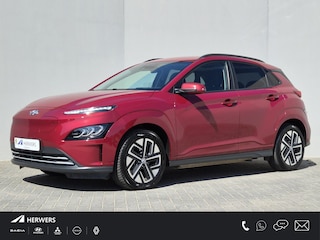 Hyundai Kona EV Pure 64 kWh / SOH 100% / CCS snelladen / Stoelverwarming / Krell Audio Systeem / Apple Carplay Android Auto / Draadloze telefoon lader / Achteruitrijcamera / Keyless Entry/Start / Parkeersensoren achter / Navigatie /