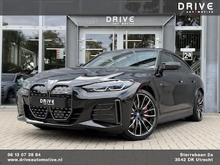 BMW i4 M50 High Ex 544 PK M-Sport Pro |Carbon in/exterieur|Pano|Laser|H/K|M-seats|20"|Trekhaak