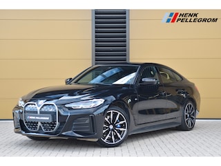 BMW i4 eDrive40 High Executive 84 kWh * M-Sport * Trekhaak * M-Remmen * SOH 96% * Elektrische Stoelen met Memory * Head-up *