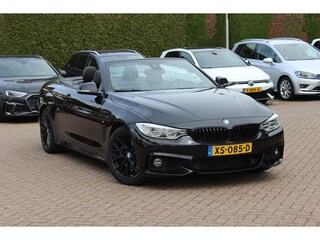 BMW 4-serie Cabrio 435i High Exe. M Sport / Akrapovic / Camera / Head-up / Leder / Windscherm / Nekverwarming / 18'' / Harman Kardon / Keyless / Navigatie / Stuur+Stoelverwarming / Dodehoek / DAB / Cruise Control