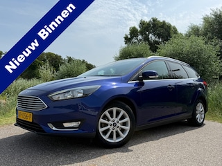 Ford Focus Wagon 1.0 Titanium | 1e Eigenaar | Apple CarPlay/Android Auto | Trekhaak | Navi | Clima | 16" Velgen | PDC | Cruise |