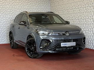 Volkswagen Tiguan 1.5 eHYBRID 272 PK R-LINE VW.TREKHAAK BLACK PANO XL.NAVI STOEL/STUUR VERW. BLACK.STYLE 360.CAM ELEK.KLEP MATRIX.LED 20''LMV MASSAGE SCHUIFDAK PHEV PLUG IN HYBRID ✅Top Auto's Wijchen , 30 Jaar Specialist in Volkswagen  : Alle Type's : R-Line Edition / Style / First Edition / Highline / Life , Zowel PHEV / HEV / MHEV / Benzine ✅