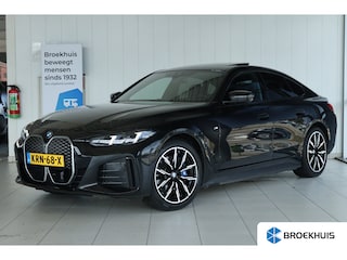 BMW i4 eDrive40 M Sport Edition 84 kWh | SoH 95% | Cruise Control | Schuifdak | 360 Camera | Head-up | Stoelverwarming | Laser | Elektr. klep | Carplay | Navi | Keyless | Leder | 19 Inch