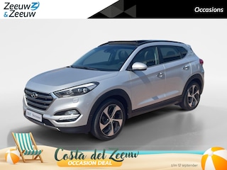 Hyundai Tucson 1.6 T-GDi Premium 4WD *Automaat*Navi+Camera*Schuif/kanteldak*Climate Control*Stoel verwarming/ventilatie*Parc Assist*LM.Velgen*Nette auto!