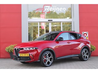 Alfa Romeo Tonale 1.5T 160PK Hybrid Veloce TECHNOLOGY PACK: PARKEERWAARSCHUWING VOOR EN ACHTER/360° CAMERA / AUTONOMOUS DRIVING LEVEL 2: ADAPTIVE CRUISE CONTROL/LANE CENTERING ASSIST/TRAFFIC JAM ASSIST DODEHOEK DETECTIE AUTOMATISCH DIMMENDE BUITENSPIEGELS ELEKTRISCH BEDIENBARE ACHTERKLEP | 19" LICHTMETALEN VELGEN | DRAADLOZE TELEFOONLADER | NAVIGATIE | DRAADLOZE APPLE CARPLAY/ANDROID AUTO | FULL LED MATRIX KOPLAMPEN |