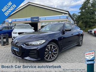 BMW i4 M50 High Executive 84 kWh | Pano | Memory stoel | Leder | M Stoelen | Comfort Access | Carbon Fibre int. | Tansanit Blau | 19" Y-spaak 859M wielen | Alarm kl.3