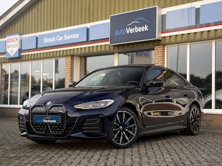 BMW i4 M50 High Executive 84 kWh | Pano | Memory stoel | Leder | M Stoelen | Comfort Access | Carbon Fibre int. | Tansanit Blau | 19" Y-spaak 859M wielen | Alarm kl.3