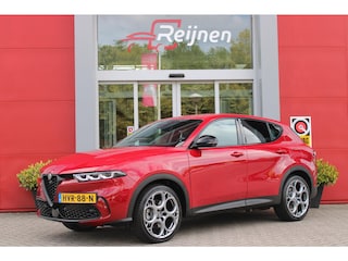 Alfa Romeo Tonale 1.3T PHEV 280PK EDIZIONE BUSINESS | AFNEEMBARE TREKHAAK | ALL SEASON BANDEN | PREMIUM PACK: LEDEREN BEKLEDING/GEVENTILEERDE VOORSTOELEN/4-VOUDIG ELEKTRISCH VERSTELBARE LENDESTEUN VOORSTOELEN/HOOGGLANS ZWARTE RAAMOMLIJSTING/AMBIENT LIGHTING | TECHNOLOGY PACK: PAARKEERWAARSCHUWING VOOR ACHTER ZIJKANT/AUTOMATISCHE INPARKEERHULP MET EXIT ASSIST/360° CAMERA/AUTONOMOUS DRIVING LEVEL 2 MET O.A. ADAPTIVE CRUISE CONTROL/BLIND SPOT DETECTION/AUTOMATISCH DIMMENDE BUITENSPIEGELS/ELEKTRISCH BEDIENBARE ACHTERKLEP/DRAADLOZE TELEFOONLADER | WINTERPACK: STOELVERWARMING VOOR/STUURVERWARMING/VERWARMBARE RUITENSPROEIERS | HARMAN KARDON SOUND SYSTEM | DRAADLOZE APPLE CARPLAY/ANDROID AUTO | NAVIGATIE | 20" LICHTMETALEN VELGEN "GRAPHITE GREY" |